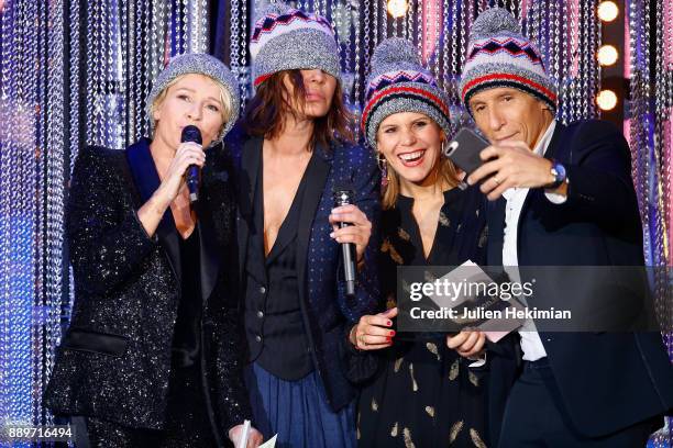 Sophie Davant, Zazie, guest and Nagui perform on stage during the 31st France Television Telethon at Pavillon Baltard on December 9, 2017 in...