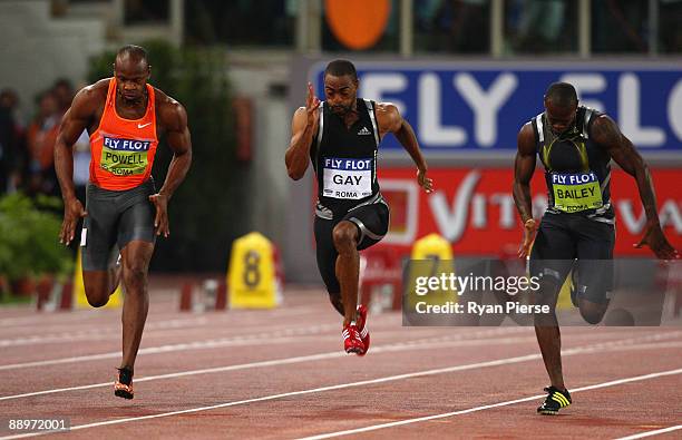 Tyson Gay of United States competes ahead of Asafa Powell of Jamaica and Daniel Bailey of Antigua and Barbuda in the men's 100 metres during the IAAF...