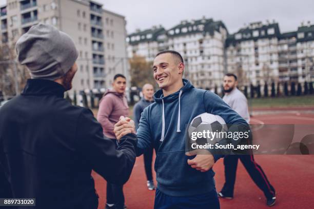 fairplay before the game - urban football pitch stock pictures, royalty-free photos & images