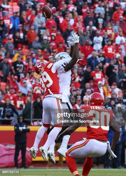 Kansas City Chiefs cornerback Terrance Mitchell defends and knocks the ball away from Oakland Raiders wide receiver Johnny Holton to seal the victory...