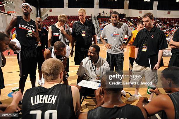 Assistant coach T.R. Dunn of the Houston Rockets instructs his players during the game against the Golden State Warriors during NBA Summer League...