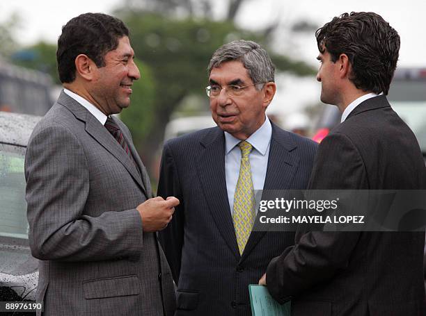 Milton Jimenez , member of the delegation representing ousted Honduran President Manuel Zelaya, speaks with Costa Rican President Oscar Arias and...