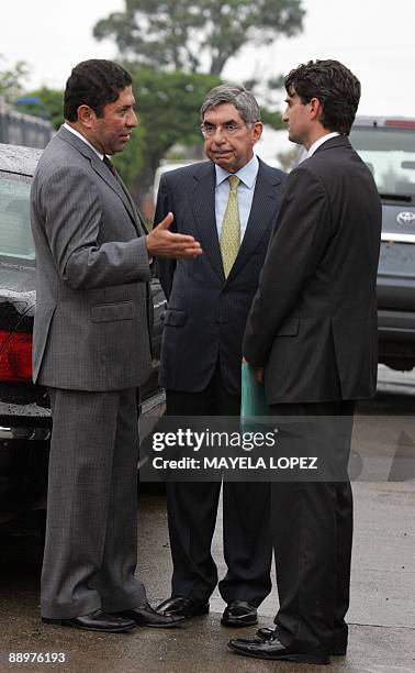 Milton Jimenez , member of the delegation representing ousted Honduran President Manuel Zelaya, speaks with Costa Rican President Oscar Arias and...