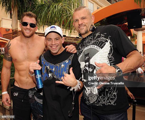 Ryan Bader, Jens Pulver and Chuck Liddell attend TAO Beach on July 10, 2009 in Las Vegas, Nevada.