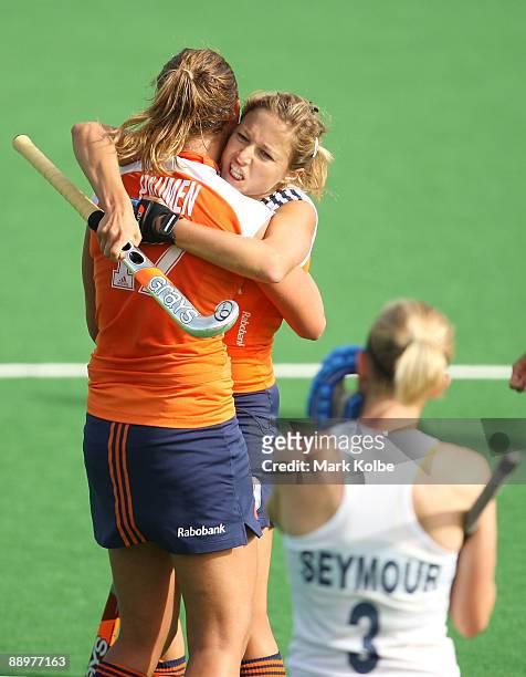 Maartje Paumen of the Netherlands celebrates with Wieke Dijkstra of the Netherlands after scoring a goal in the final play of the game making the...