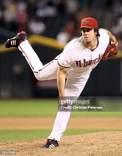 Starter Dan Haren of the Arizona Diamondbacks pitches against the Florida Marlins during the ninth inning at Chase Field on July 10, 2009 in Phoenix,...