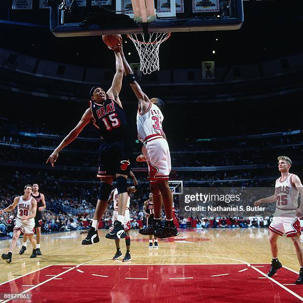 Chris Gatling of the Miami Heat goes up for a shot against Scottie Pippen of the Chicago Bulls in Game One of the Eastern Conference Quarterfinals...