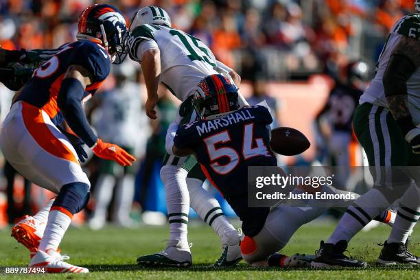 Inside linebacker Brandon Marshall of the Denver Broncos sacks quarterback Josh McCown of the New York Jets and forces a fumble during the first...