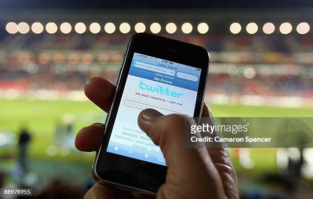 In this photo illustration the Twitter website is displayed on a mobile phone at a NRL match on July 11, 2009 in Newcastle, Australia. The...