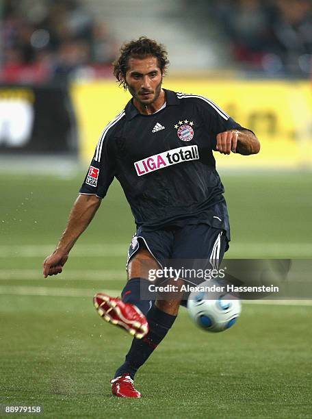 Hamit Altintop of Muenchen plays he ball during the pre-season friendly match between Red Bull Salzburg and FC Bayern Muenchen at the Red Bull Arena...