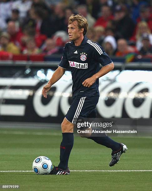 Andreas Ottl of Muenchen runs with the ball during the pre-season friendly match between Red Bull Salzburg and FC Bayern Muenchen at the Red Bull...