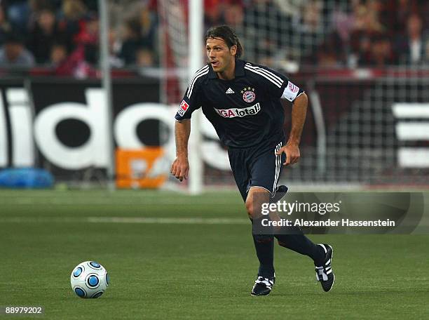 Martin Demichelis of Muenchen runs with the ball during the pre-season friendly match between Red Bull Salzburg and FC Bayern Muenchen at the Red...