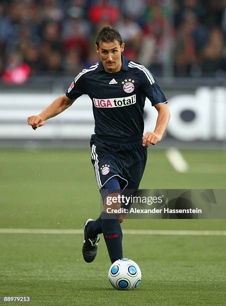 Miroslav Klose of Muenchen runs with the ball during the pre-season friendly match between Red Bull Salzburg and FC Bayern Muenchen at the Red Bull...