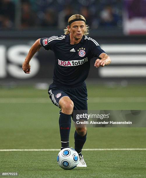 Anatoliy Tymoshchuk of Muenchen runs with the ball during the pre-season friendly match between Red Bull Salzburg and FC Bayern Muenchen at the Red...