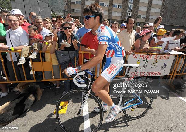 Dutch cycling team Skil-Shimano 's rider Fumiyuki Beppu of Japan rides to the signature ceremony on July 11, 2009 in Andorre-la-Vella before the...