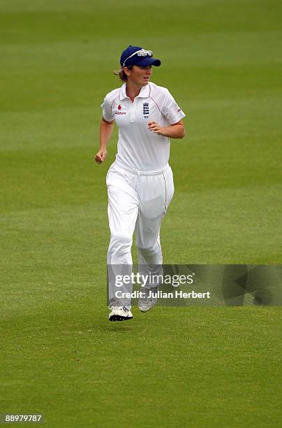 Charlotte Edwards of England runs in the field during The 2nd Day of The 1st Test between England Women and Australia Women at New Road on July 11,...