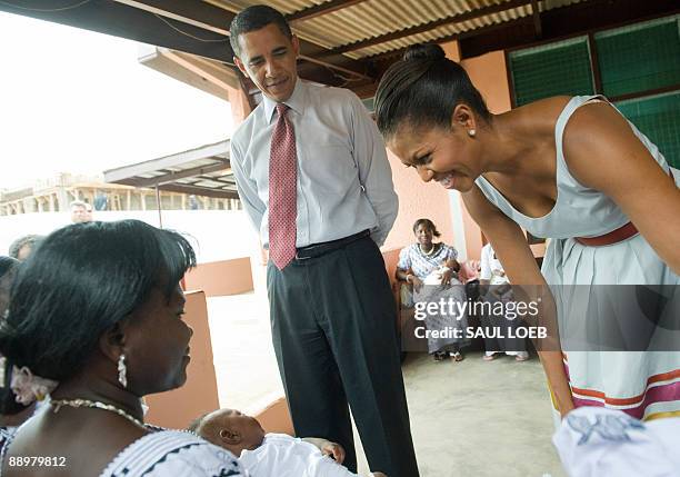 President Barack Obama and US First Lady Michelle Obama tour the La General Hospital in Accra on July 11, 2009. The visit marks Obama's first to...