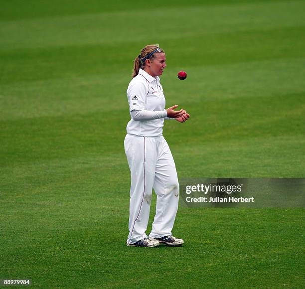 Holly Colvin of England prepares to bowl during The 2nd Day of The 1st Test between England Women and Australia Women at New Road on July 10, 2009 in...
