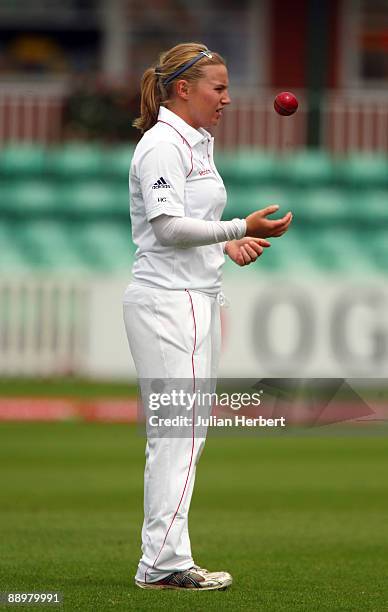 Holly Colvin of England prepares to bowl during The 2nd Day of The 1st Test between England Women and Australia Women at New Road on July 10, 2009 in...