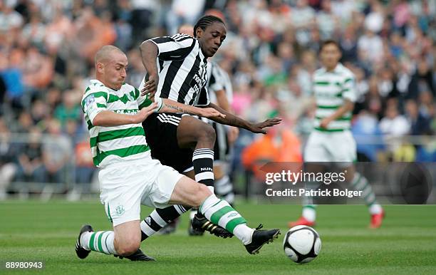 Nile Ranger of Newcastle and Barry Johnston of Shamrock Rovers in action during the pre-season friendly match between Shamrock Rovers and Newcastle...