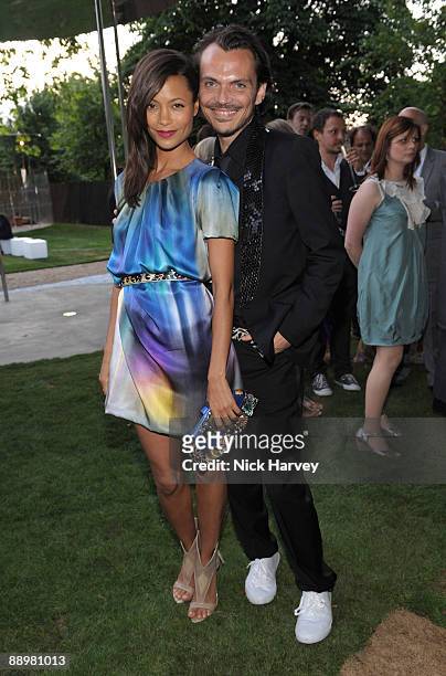 Actress Thandie Newton and fashion designer Matthew Williamson attend the annual Summer Party at the Serpentine Gallery on July 9, 2009 in London,...