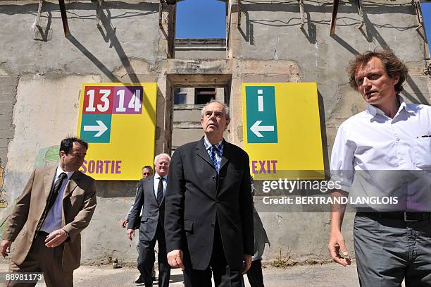 French Culture minister Frederic Mitterrand arrives to visit exhibtions of the "Rencontres photographiques d'Arles" international photo festival,...