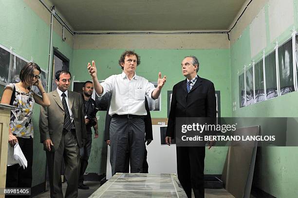 French Culture minister Frederic Mitterrand visits the US photographer David Armstrong's exhibition at the "Rencontres photographiques d'Arles"...