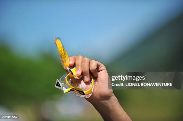 Picture shows wristband from Armstrong association, Livestrong, which fights cancer, on July 11, 2009 during the 176 km and eighth stage of the 2009...