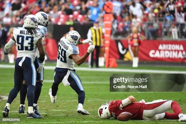 Wesley Woodyard of the Tennessee Titans celebrates a sack on Blaine Gabbert of the Arizona Cardinals in the second half of the NFL game at University...