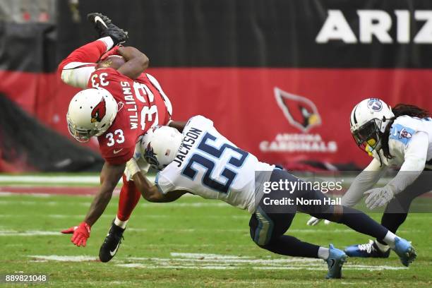 Kerwynn Williams of the Arizona Cardinals is tackled by Adoree' Jackson of the Tennessee Titans in the second half at University of Phoenix Stadium...