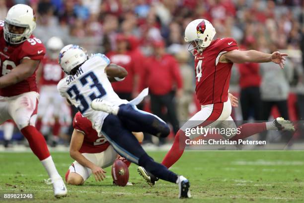 Phil Dawson of the Arizona Cardinals kicks a 47 yard field goal against the Tennessee Titans in the second half at University of Phoenix Stadium on...