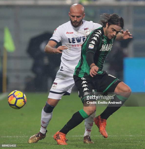 Alessandro Matri of US Sassuolo Calcio competes for the ball with Arlind Ajeti of FC Crotone during the Serie A match between US Sassuolo and FC...
