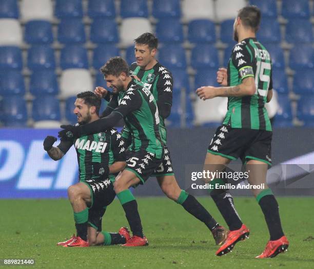 Matteo Politano of US Sassuolo Calcio celebrates his goal with his team-mate Domenico Berardi and Federico Peluso during the Serie A match between US...