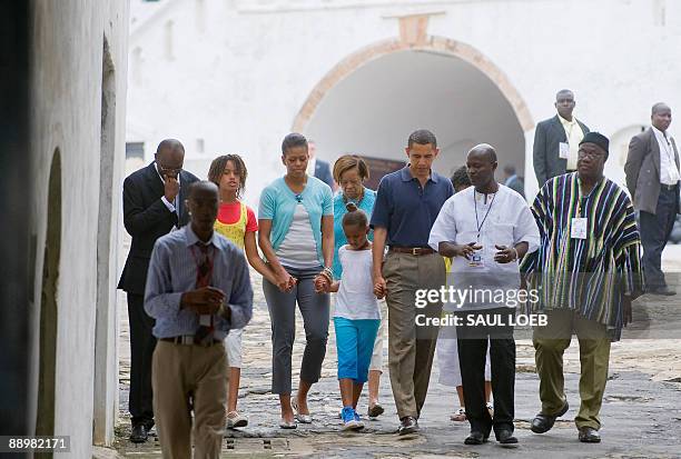 President Barack Obama , alongside First Lady Michelle Obama and daughters Sasha and Malia tour Cape Coast Castle, in Cape Coast, Ghana, on July 11,...