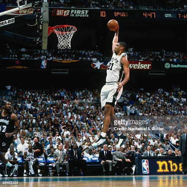 Tim Duncan of the San Antonio Spurs dunks against the Minnesota Timberwolves in Game Two of the Western Conference Quarterfinals during the 1999 NBA...
