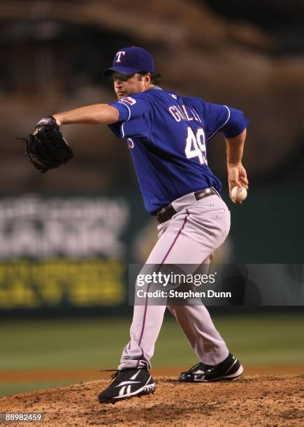 Jason Grilli of the Texas Rangers throws a pitch against the Los Angeles Angels of Anaheim on July 8, 2009 at Angel Stadium in Anaheim, California....