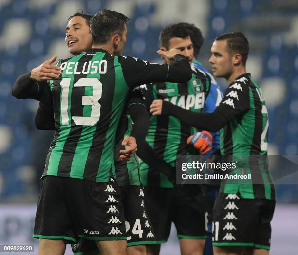 Edoardo Goldaniga of US Sassuolo Calcio celebrates the victory with his team-mate Federico Peluso at the end of the Serie A match between US Sassuolo...