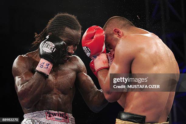 Sugar Jackson Osei Bonsu of Belgium fights against Turkish Selcuk Aydin during their European Title match on July 11, 2009 in Istanbul. Aydin won the...
