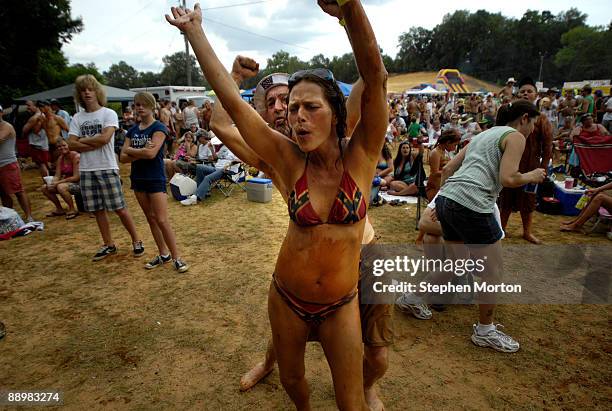 Billy and Rhonda Wood of Milleageville, Georgia dance to live music during the 13th Annual Summer Redneck Games July 11, 2009 in East Dublin,...