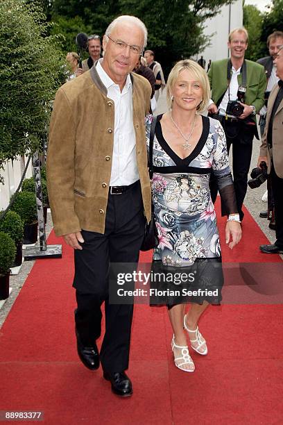 Franz Beckenbauer and wife Heidi attend a party after 'Kaiser Cup 2009' golf tournament at the Hartl Resort Event Hall on July 11, 2009 in Bad...