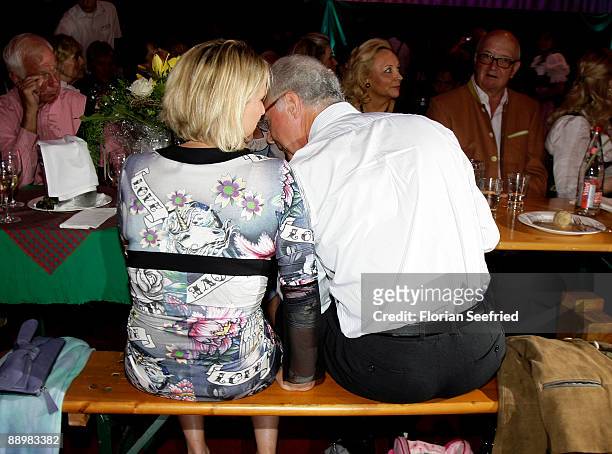 Franz Beckenbauer and wife Heidi attend a party after 'Kaiser Cup 2009' golf tournament at the Hartl Resort Event Hall on July 11, 2009 in Bad...