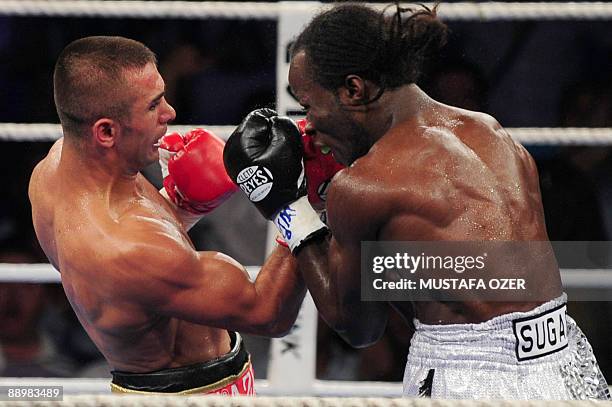 Sugar Jackson Osei Bonsu of Belgium fights against Turkish Selcuk Aydin during their European Title match on July 11, 2009 in Istanbul. Aydin won the...