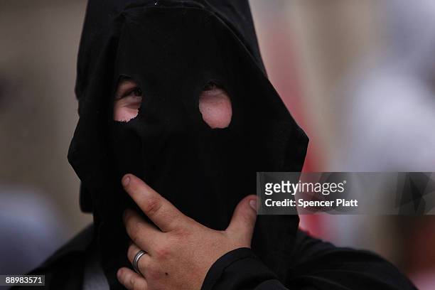 Member of the Fraternal White Knights of the Ku Klux Klan participates in the 11th Annual Nathan Bedford Forrest Birthday march July 11, 2009 in...