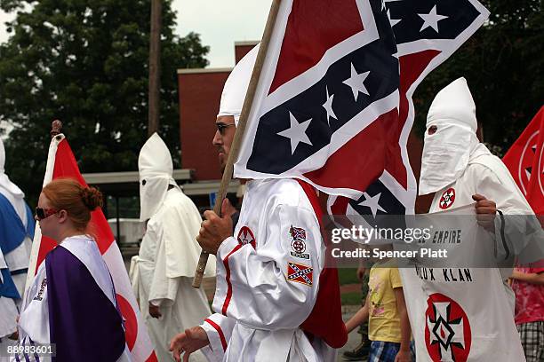 Members of the Fraternal White Knights of the Ku Klux Klan participate in the 11th Annual Nathan Bedford Forrest Birthday march July 11, 2009 in...