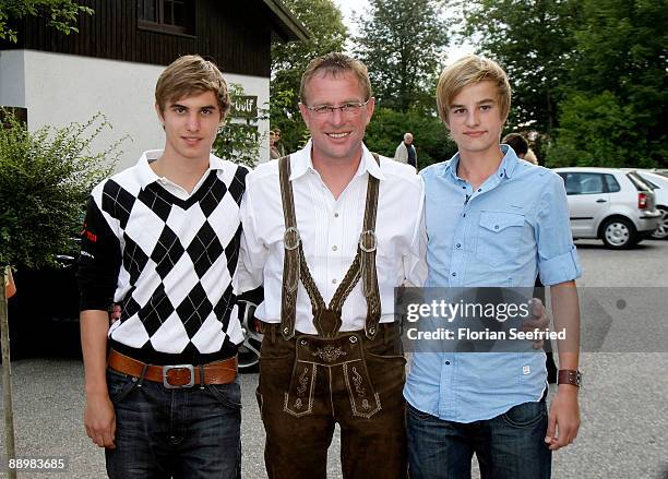 Ralf Rangnick and sons Kevin and David attend a party after 'Kaiser Cup 2009' golf tournament at the Hartl Resort Event Hall on July 11, 2009 in Bad...