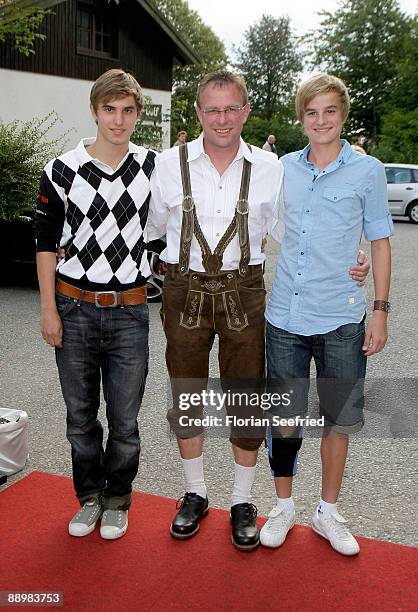 Ralf Rangnick and sons Kevin and David attend a party after 'Kaiser Cup 2009' golf tournament at the Hartl Resort Event Hall on July 11, 2009 in Bad...