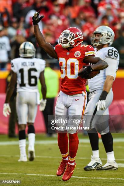 Defensive back Steven Terrell of the Kansas City Chiefs celebrates in the end zone after a game sealing interception against the Oakland Raiders at...