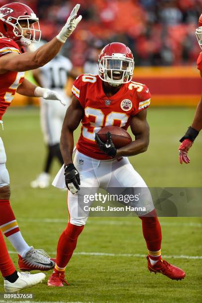 Defensive back Steven Terrell of the Kansas City Chiefs celebrates in the end zone after a game sealing interception against the Oakland Raiders at...