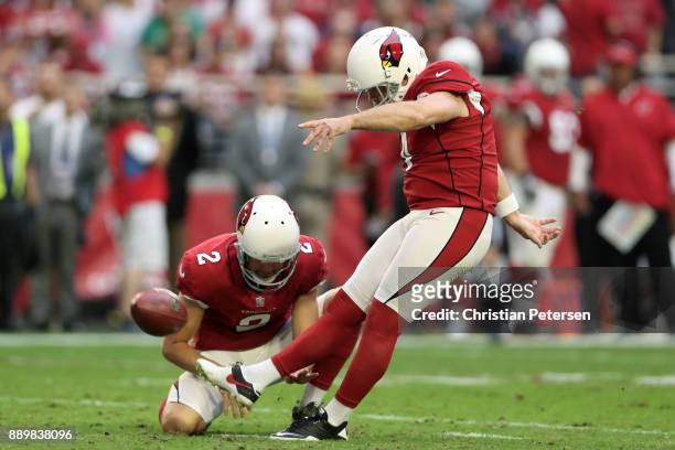 Phil Dawson of the Arizona Cardinals kicks a 23 yard field goal against the Tennessee Titans in the second half at University of Phoenix Stadium on...