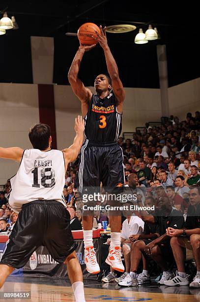 Cartier Martin of the Golden State Warriors shoots over Omri Casspi of the Sacramento Kings during NBA Summer League presented by EA Sports on July...